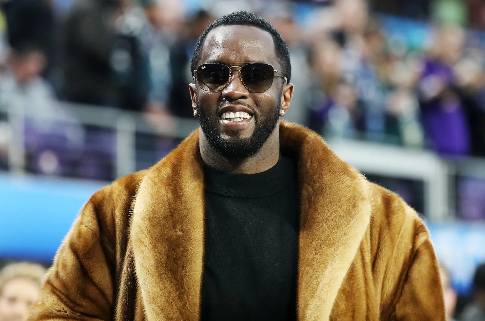 Diddy Celebrates 49th Birthday By Skydiving Onto Playboy Mansion Grounds |  Billboard