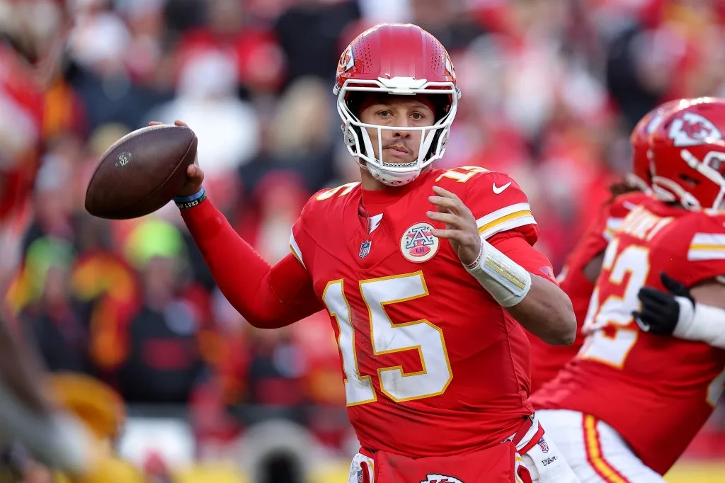 Patrick Mahomes #15 of the Kansas City Chiefs looks to pass against the Las Vegas Raiders during the second quarter in the game at GEHA Field at Arrowhead Stadium on November 29, 2024 in Kansas City, Missouri.